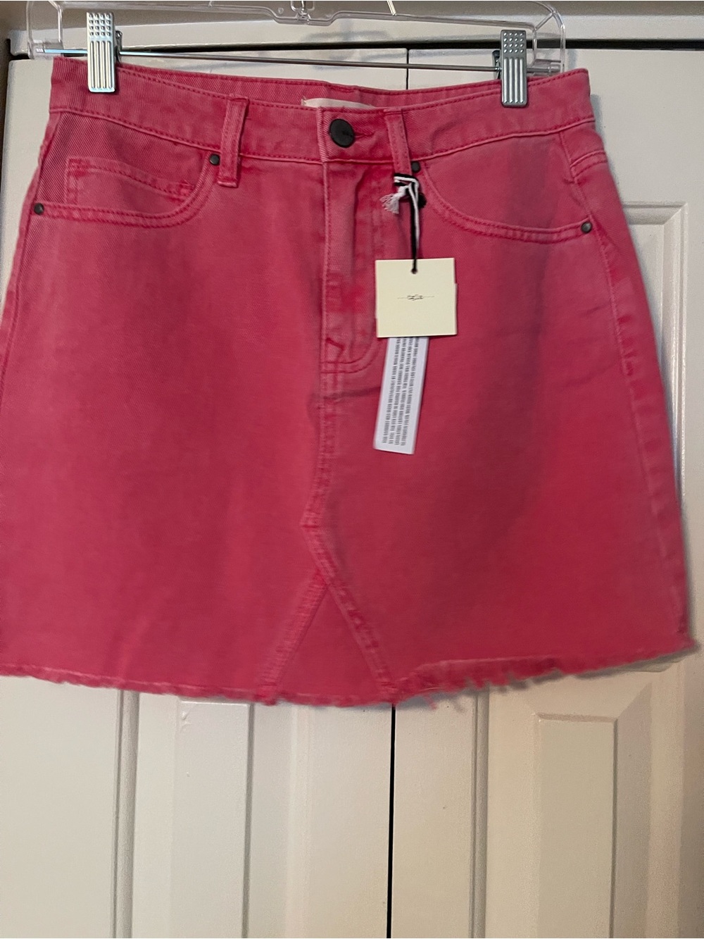Casual Pink Denim Mini Skirt with Frayed Hem